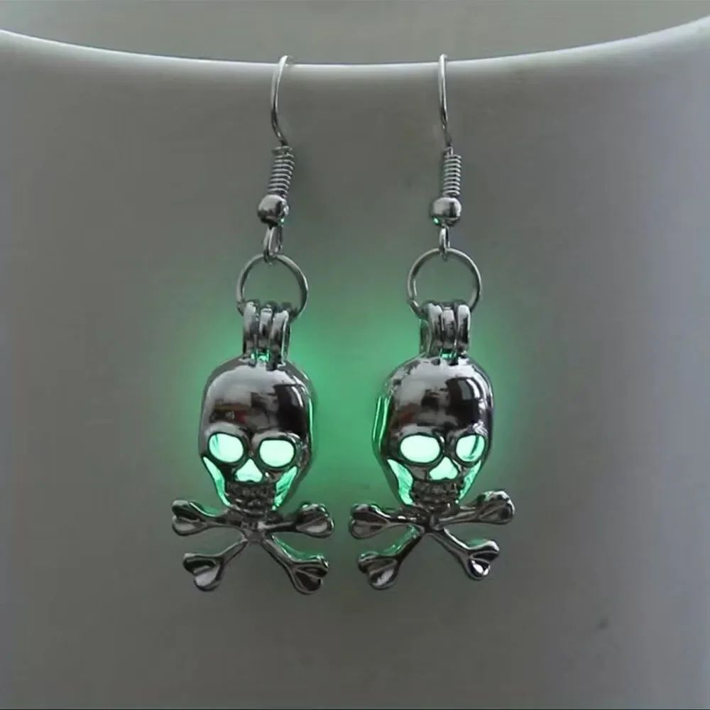 Luminous skull, head dangle earrings.Alloy material, measurements, and pictures.